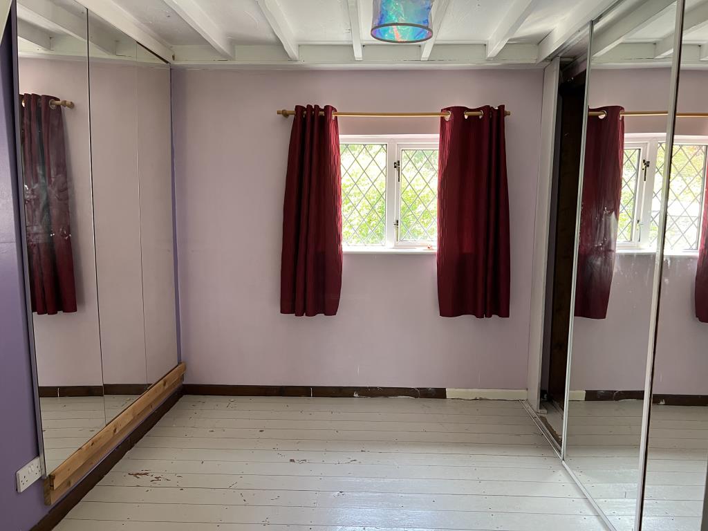 Lot: 35 - FOUR-BEDROOM PERIOD COTTAGE ON QUARTER-ACRE PLOT - Bedroom with built in wardrobes with sliding doors